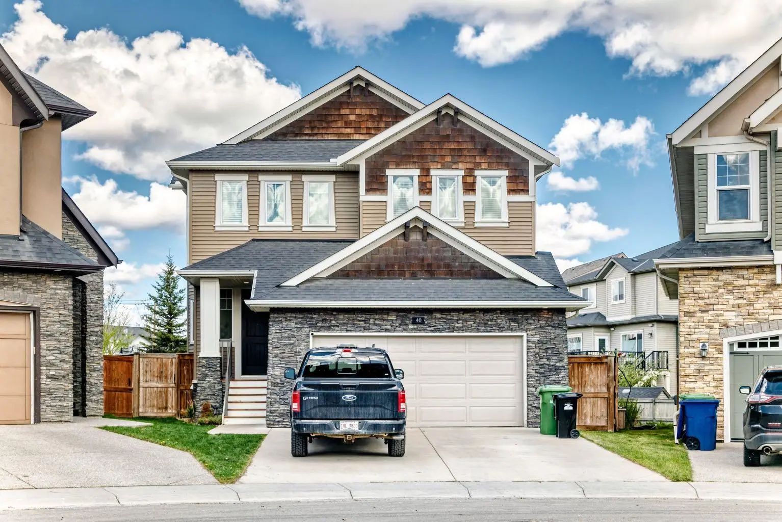 Photo for MLS®# A2335731 - home for sale at 40 Cooperstown Place Southwest, Coopers Crossing, Airdrie Alberta