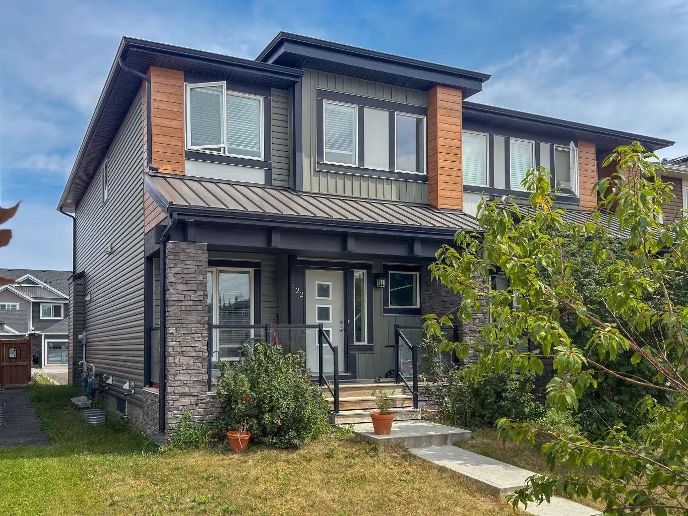 122 Midtown Boulevard Southwest, Airdrie – Residential Semi Detached (Half Duplex) Listing Photo 2