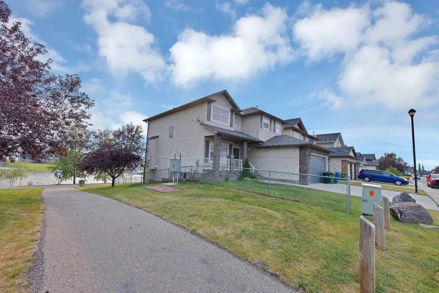 1125 Channelside Drive Southwest, Airdrie – Residential Detached Listing Photo 2