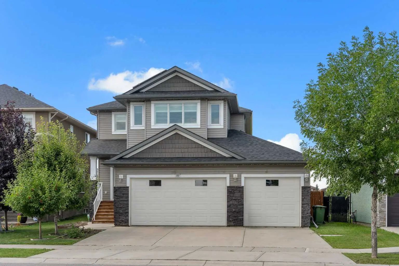 Photo for MLS®# A2340099 - home for sale at 353 Kinniburgh Boulevard , Kinniburgh North, Chestermere Alberta