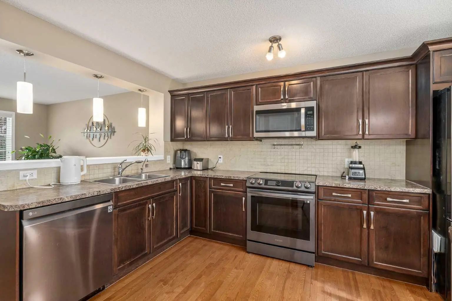 240 Elgin Meadows Gardens Se Calgary Alberta T2Z 0M4 McKenzie Towne Home For Sale