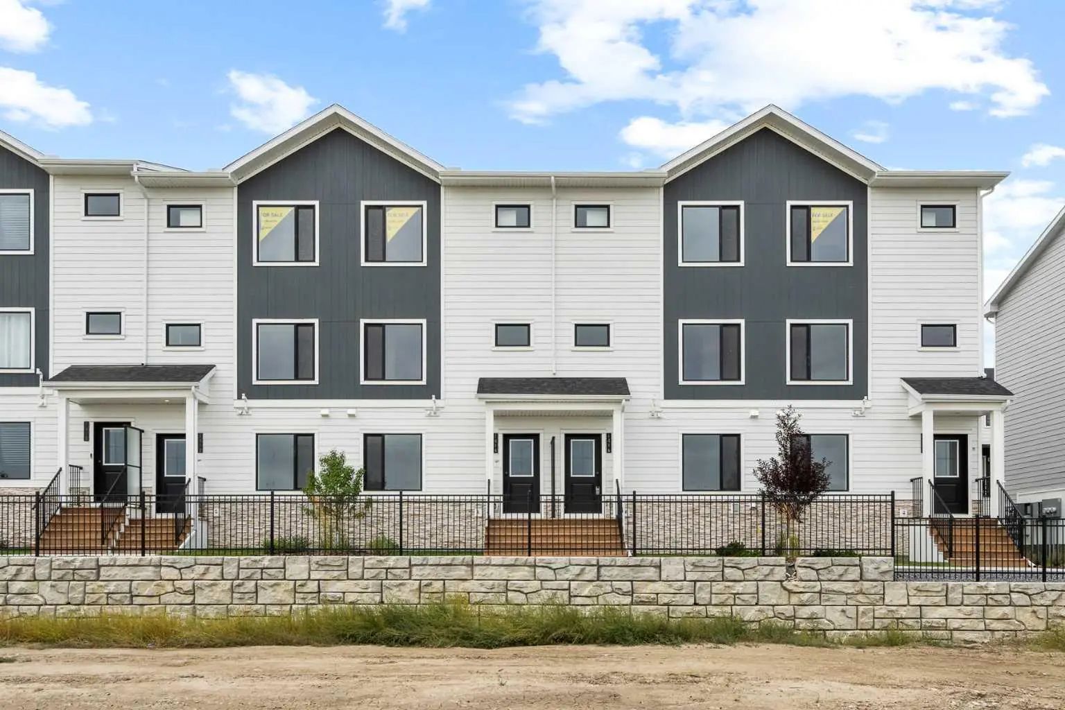 Photo for MLS®# A2342475 - home for sale at 1414 25 Wildwoods Court Southwest, Wildflower, Airdrie Alberta