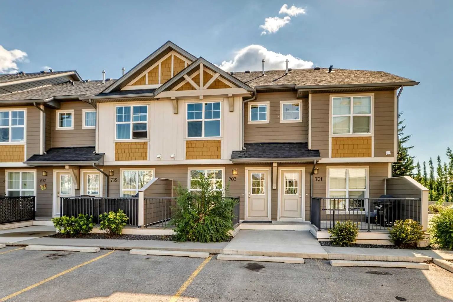 Photo for MLS®# A2342829 - home for sale at 703 101 Sunset Drive , Sunset Ridge, Cochrane Alberta