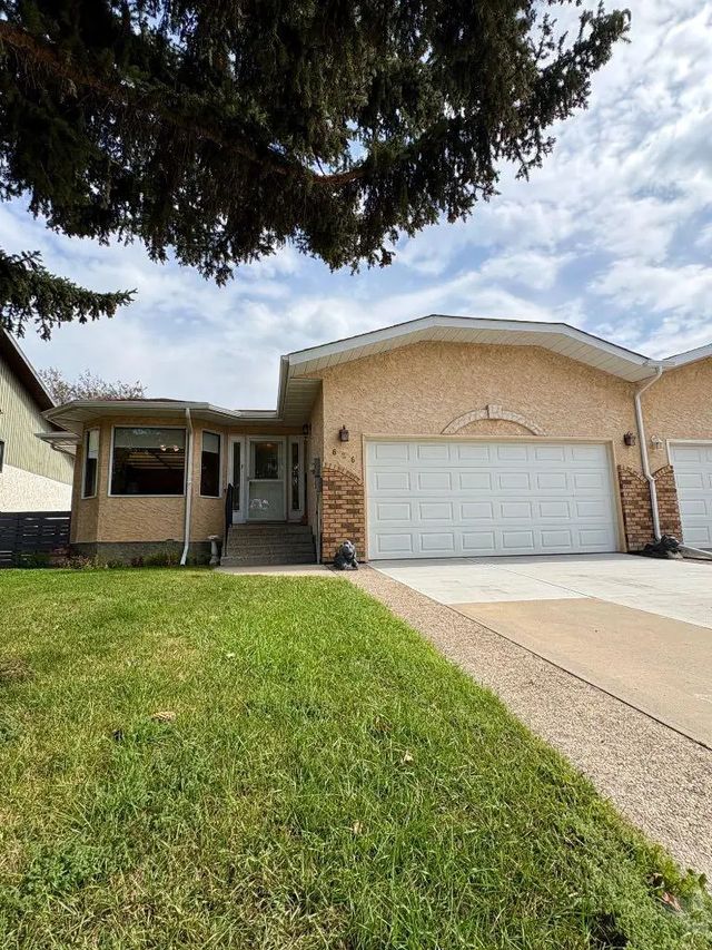 626 Prairie Meadows Close W, Brooks