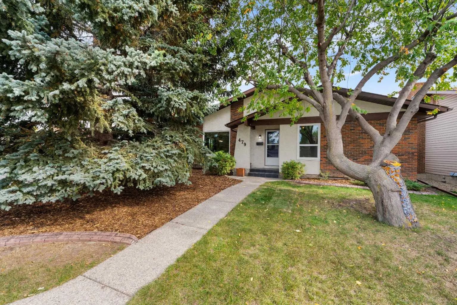 Photo for MLS®# A2348213 - home for sale at 479 Bracewood Crescent Southwest, Braeside, Calgary Alberta