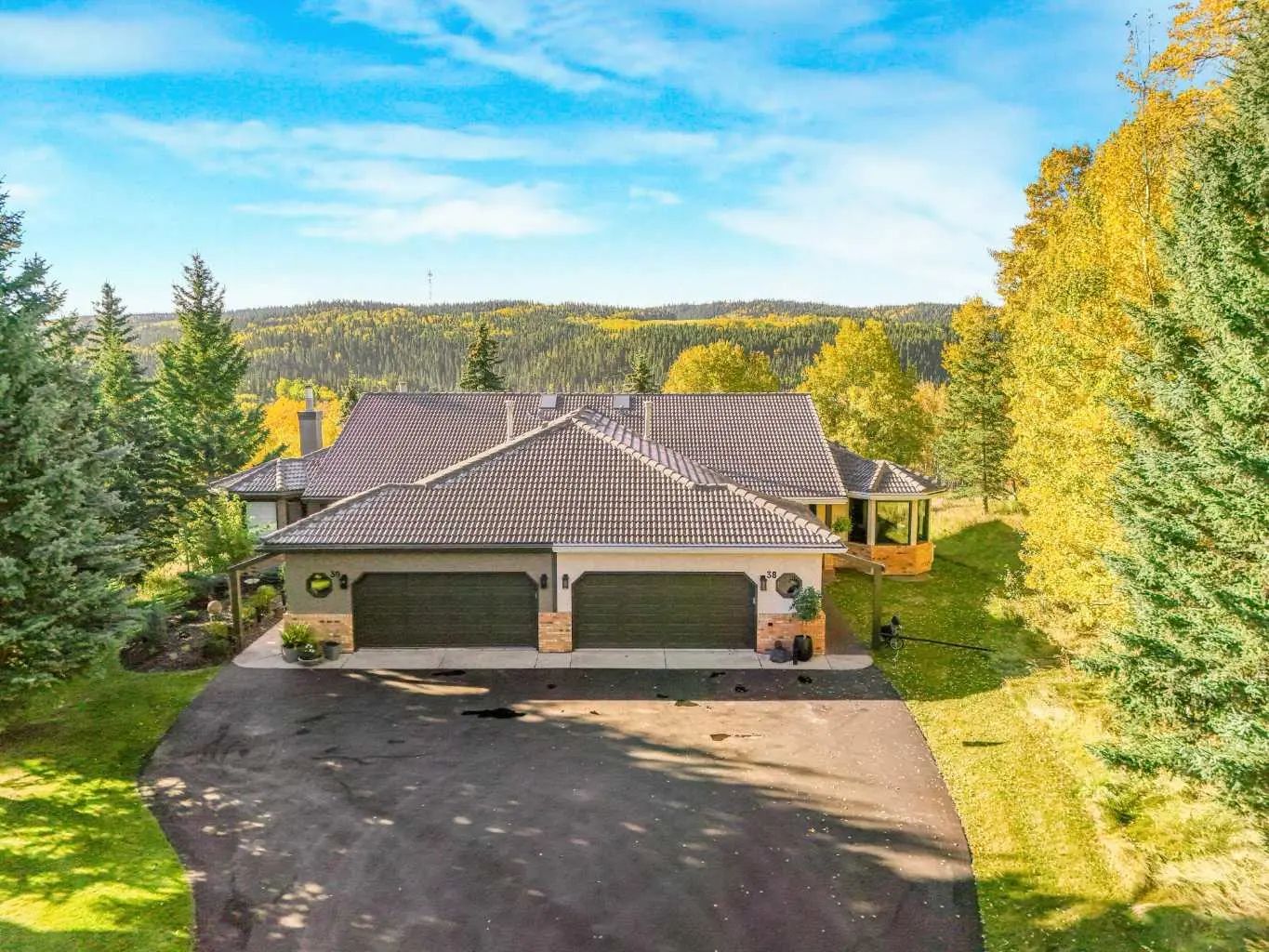 Home for Sale Located at 38 Sunrise Way , Priddis Greens, Alberta