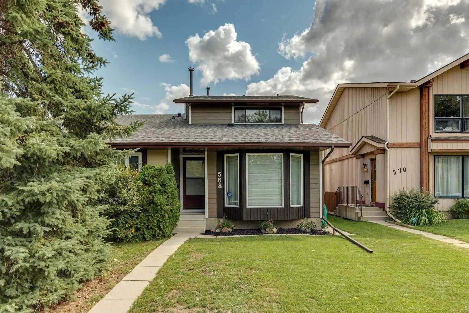 Photo for MLS®# A2351017 - home for sale at 568 Strathcona Drive Southwest, Strathcona Park, Calgary Alberta