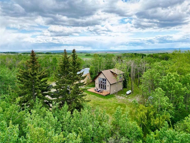 Photo for MLS®# A2228063 - home for sale at 33131 Meskanaw Road, Bearspaw_Calg, Rural Rocky View County Alberta