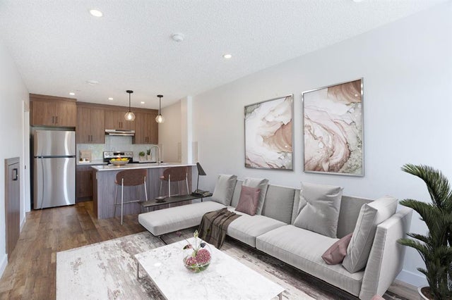 Photo for MLS®# A2230904 - home for sale at 102, 156 Park Street, Greystone, Cochrane Alberta