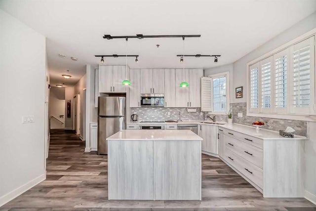 Home for Sale Located at 201, 3412 Parkdale Boulevard Northwest, Calgary, Alberta