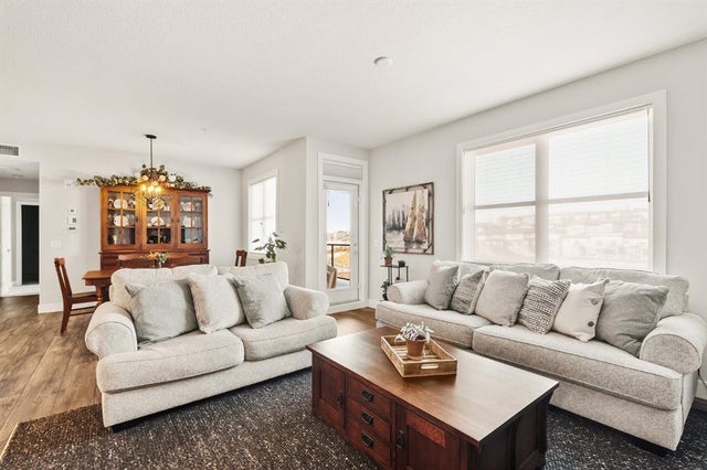 Photo for MLS®# A2233700 - home for sale at 212, 8355 19 Avenue Southwest, Springbank Hill, Calgary Alberta