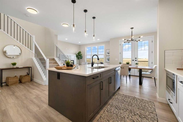 Photo for MLS®# A2235121 - home for sale at 315 Kinniburgh Loop, Kinniburgh South, Chestermere Alberta