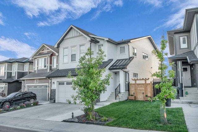 Photo for MLS®# A2237447 - home for sale at 240 Lucas Crescent Northwest, Livingston, Calgary Alberta