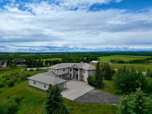 Home for Sale Located at 262060 Range Road 33, Rural Rocky View County, Alberta