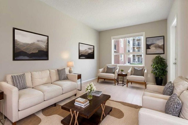 Home for Sale Located at 1107, 73 Erin Woods Court Southeast, Calgary, Alberta