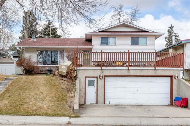Photo for MLS®# A2239554 - home for sale at 7803 Hunterslea Crescent Northwest, Huntington Hills, Calgary Alberta