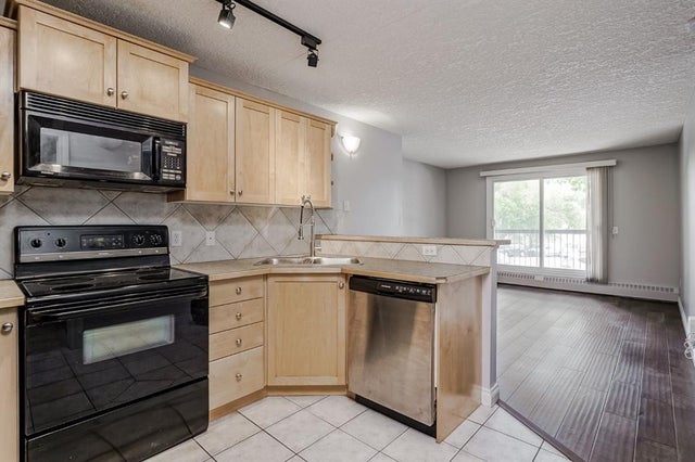 Photo for MLS®# A2240823 - home for sale at 305, 60 38a Avenue Southwest, Parkhill, Calgary Alberta