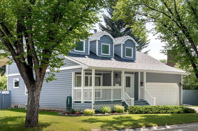 Photo for MLS®# A2241138 - home for sale at 12 Strathroy Bay Southwest, Strathcona Park, Calgary Alberta