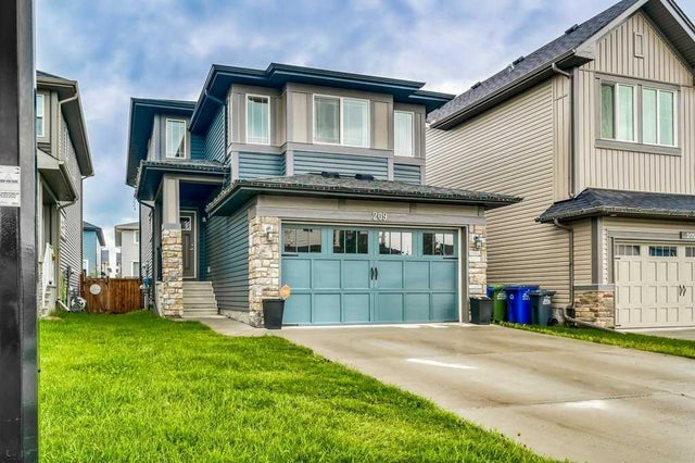 Photo for MLS®# A2241766 - home for sale at 209 Buckskin Way, Heartland, Cochrane Alberta