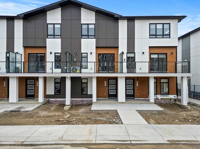 Photo for MLS®# A2241962 - home for sale at 8313 8 Avenue Southwest, West Springs, Calgary Alberta