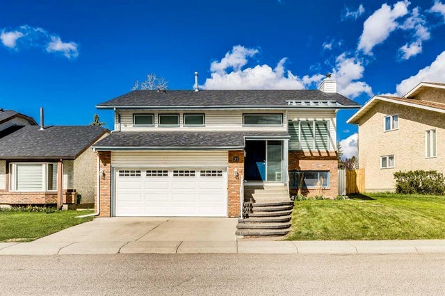 Photo for MLS®# A2242388 - home for sale at 31 Woodmont Way Southwest, Woodbine, Calgary Alberta
