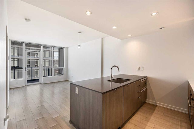 Photo for MLS®# A2242635 - home for sale at 503, 128 2 Street Southwest, Chinatown, Calgary Alberta