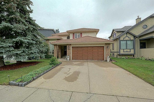 Photo for MLS®# A2244657 - home for sale at 115 Strathaven Circle Southwest, Strathcona Park, Calgary Alberta