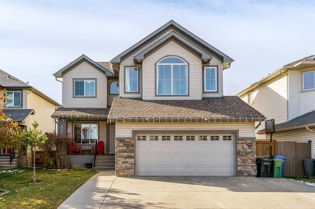 Home for Sale Located at 507 Westmount Close, Okotoks, Alberta