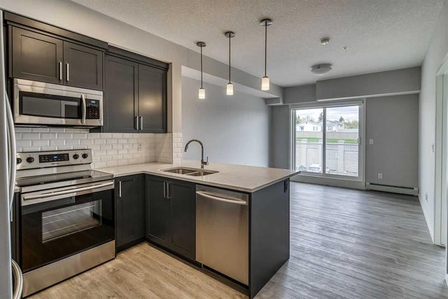 215, 300 Harvest Hills Place Ne, Calgary