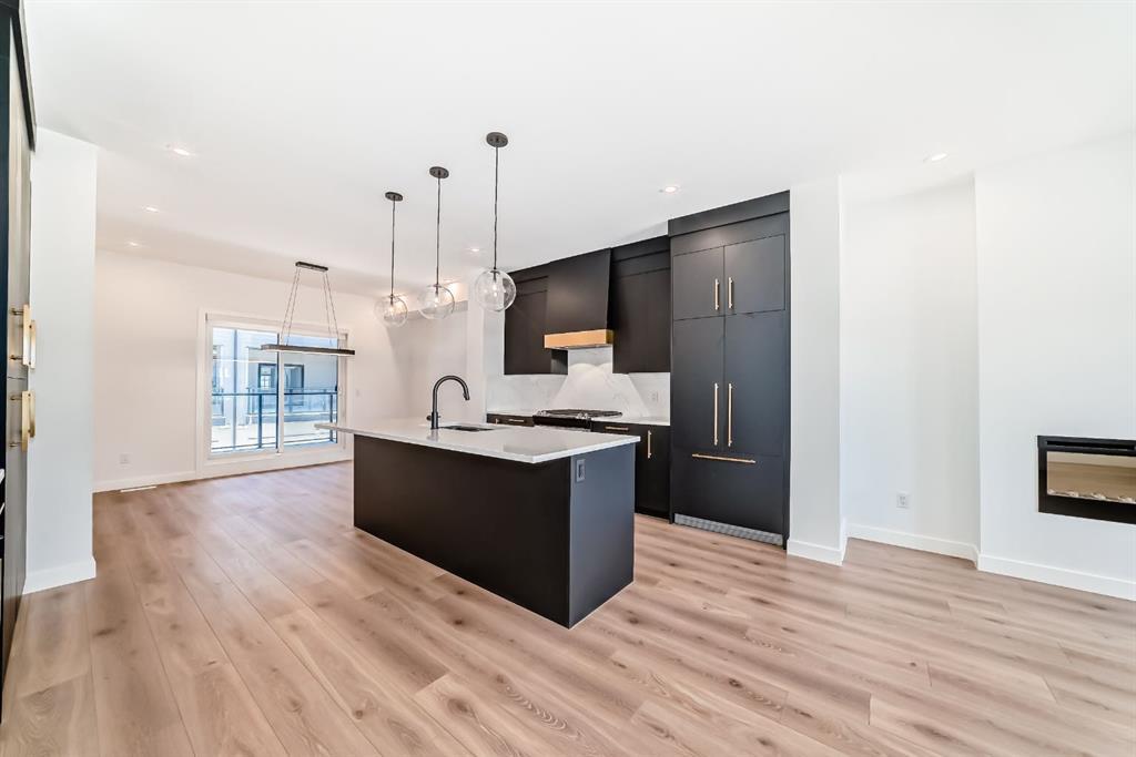 512, 8155 8 Avenue Southwest, Calgary – Residential Row/Townhouse Listing Photo 3