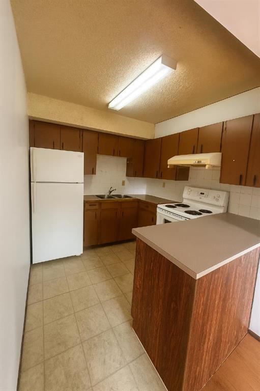 3, 11 Blackthorn Bay Northeast, Calgary – Residential Row/Townhouse Listing Photo 5