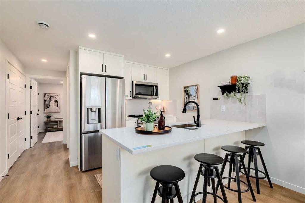 105, 155 Crimson Ridge Place Northwest, Calgary – Residential Row/Townhouse Listing Photo 7