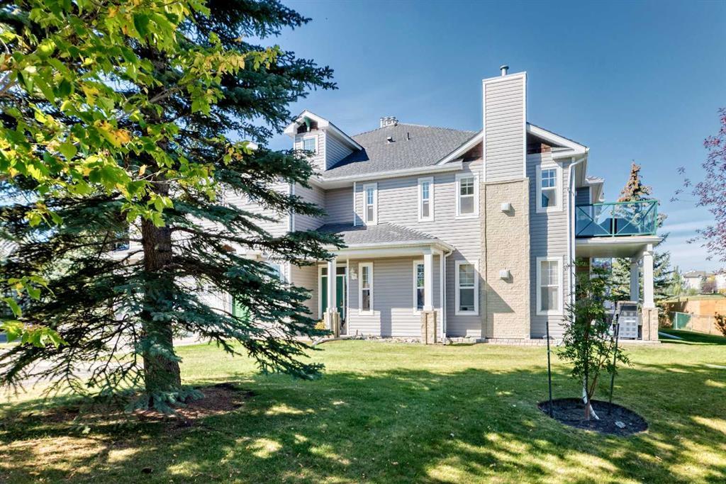 704, 39 Hidden Creek Place Northwest, Calgary – Residential Row/Townhouse Listing Photo 3