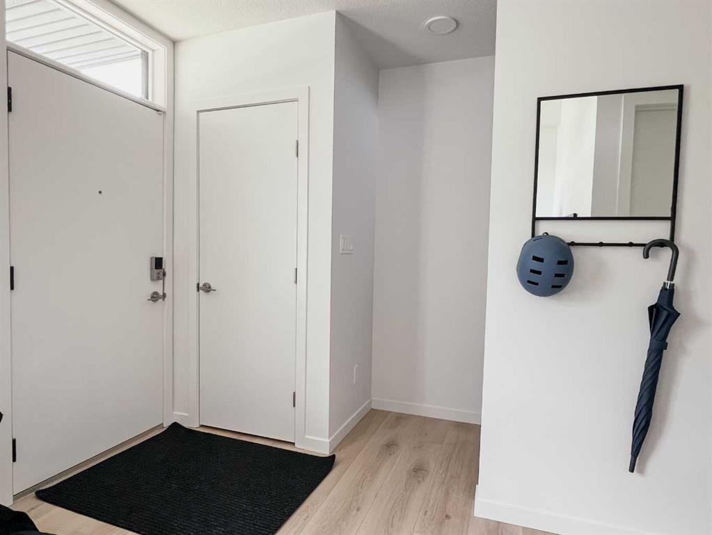 64 Arbour Lake Court Northwest, Calgary – Residential Row/Townhouse Listing Photo 2