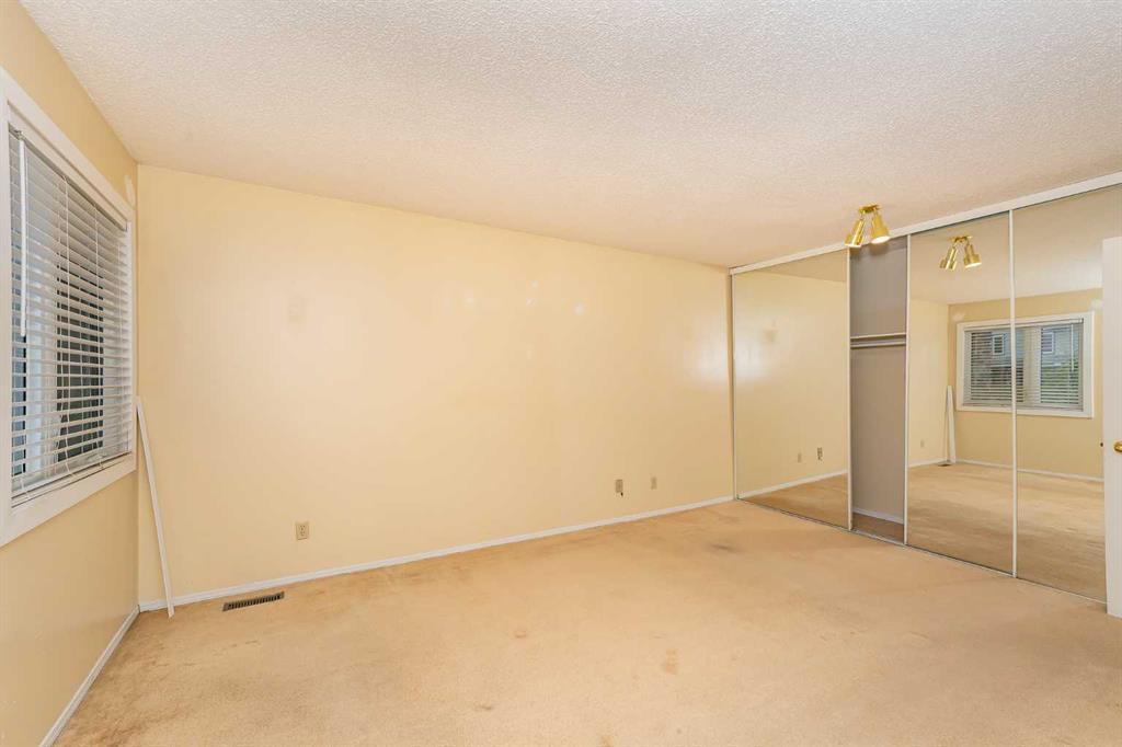 215 Coachway Lane Southwest, Calgary – Residential Row/Townhouse Listing Photo 26