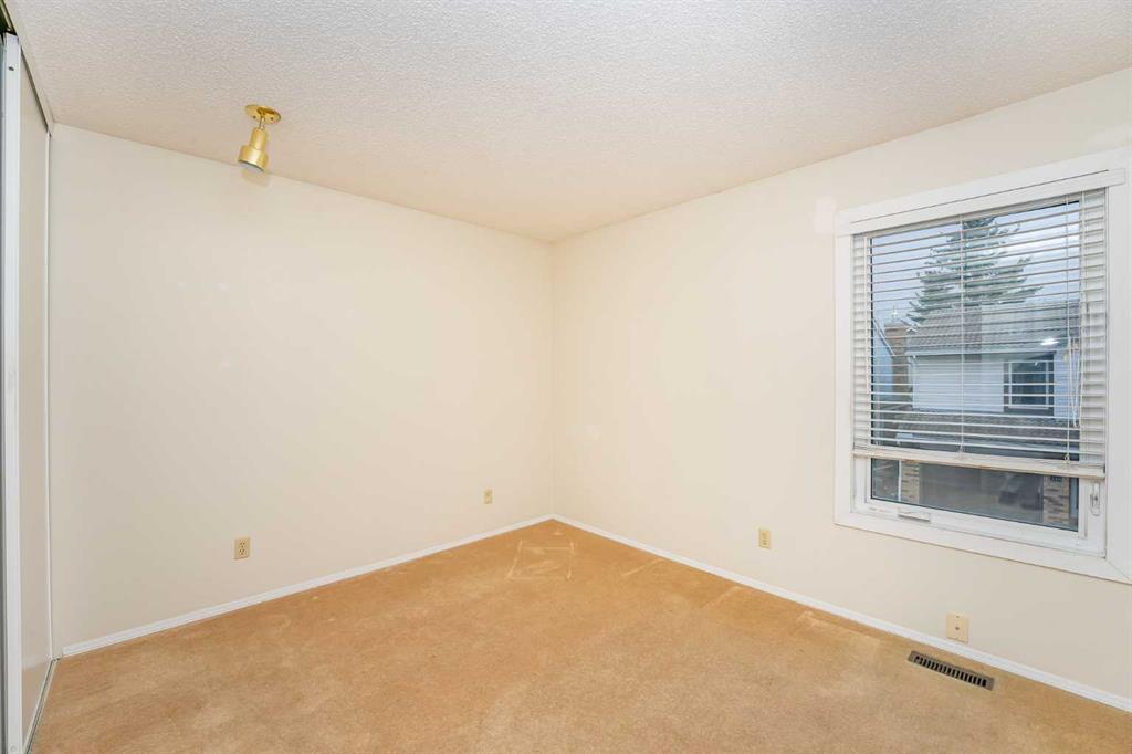 215 Coachway Lane Southwest, Calgary – Residential Row/Townhouse Listing Photo 29