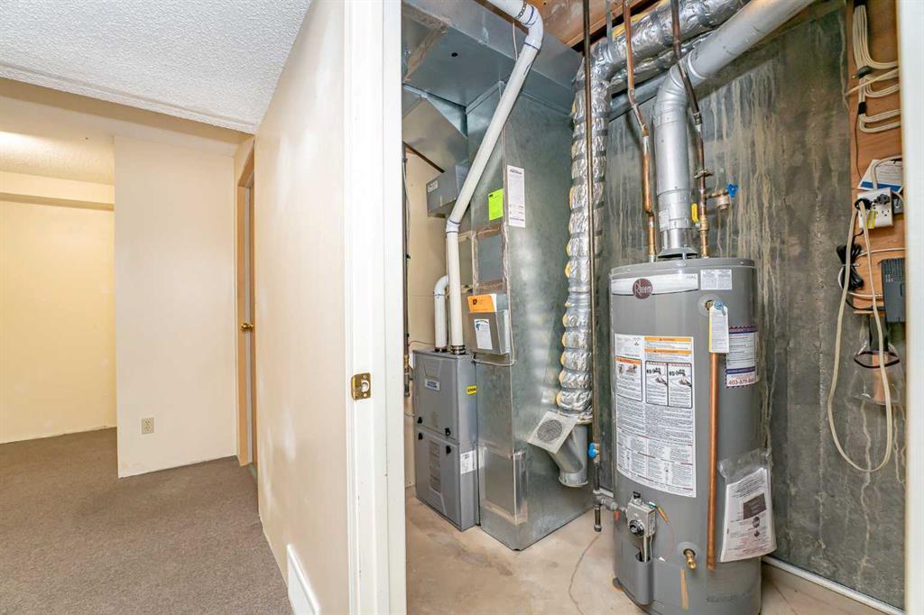 215 Coachway Lane Southwest, Calgary – Residential Row/Townhouse Listing Photo 39