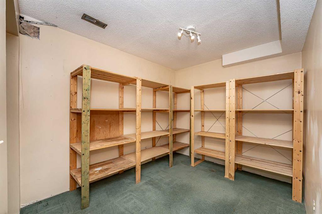 215 Coachway Lane Southwest, Calgary – Residential Row/Townhouse Listing Photo 41