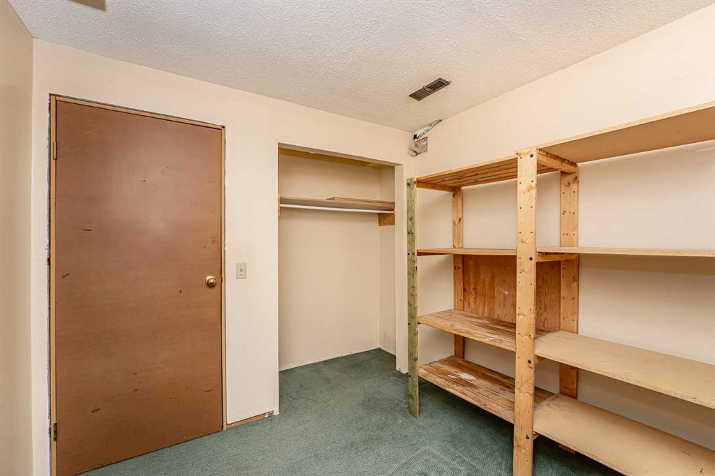 215 Coachway Lane Southwest, Calgary – Residential Row/Townhouse Listing Photo 42