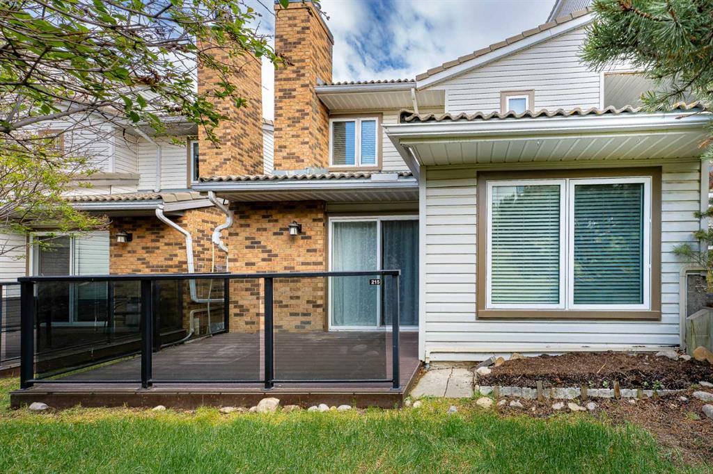 215 Coachway Lane Southwest, Calgary – Residential Row/Townhouse Listing Photo 4