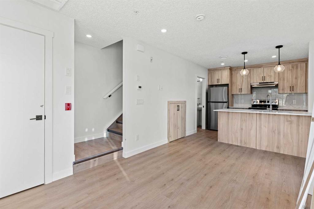 109, 156 Park Street, Cochrane – Residential Row/Townhouse Listing Photo 5