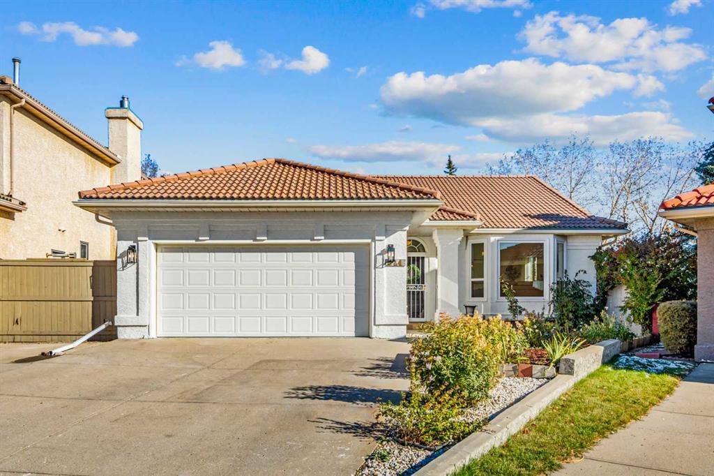 Photo for MLS®# A2263663 - home for sale at 824 Sierra Morena Place Southwest, Signal Hill, Calgary Alberta