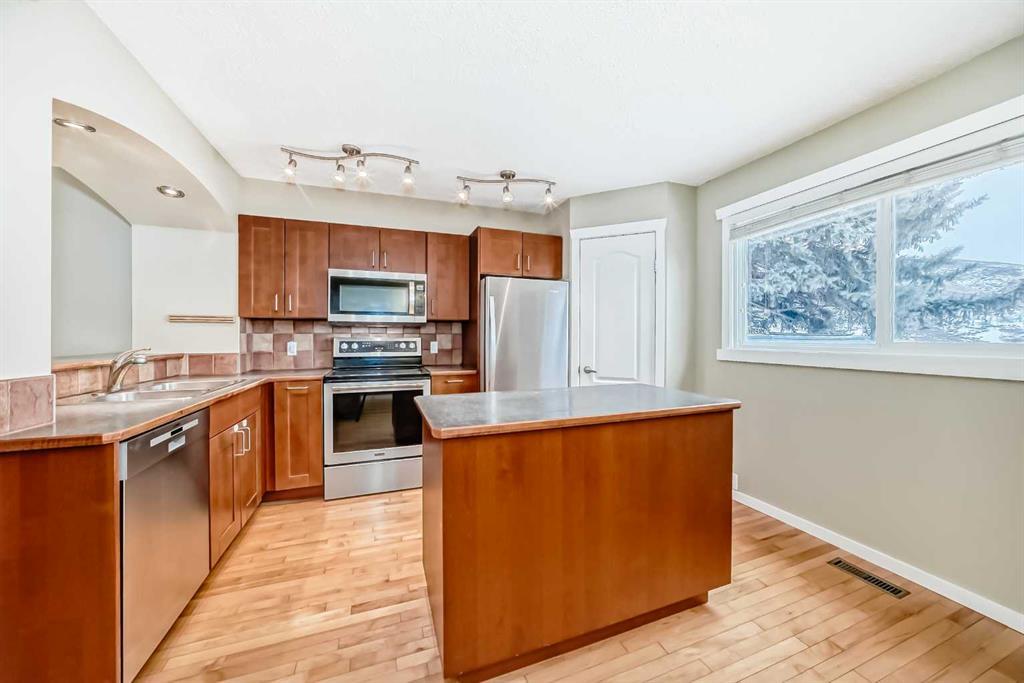 Photo for MLS®# A2272048 - home for sale at 28, 800 Bowcroft Place, East End, Cochrane Alberta