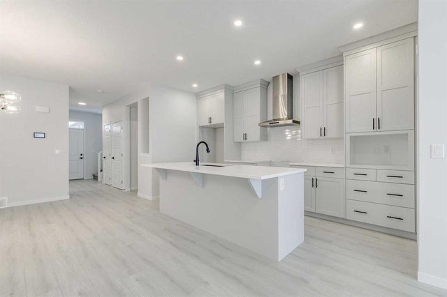 Photo for MLS®# A2272147 - home for sale at 186 Creekside Manor Southwest, Pine Creek, Calgary Alberta