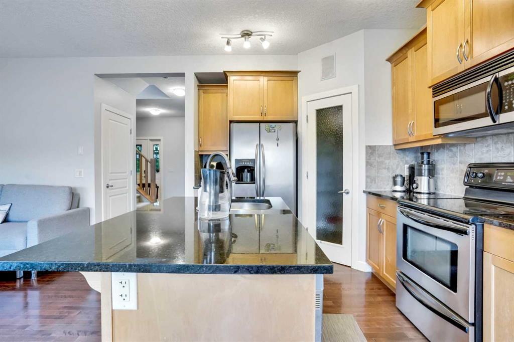 1728 Luxstone Drive Southwest, Airdrie – Residential Semi Detached Listing Photo 7