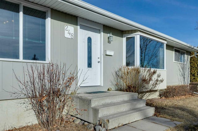 Photo for MLS®# A2284788 - home for sale at 248 Huntcroft Road Northeast, Huntington Hills, Calgary Alberta