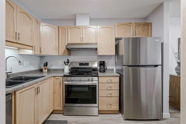 Home for Sale Located at 1308, 1308 Hawksbrow Point Northwest, Calgary, Alberta