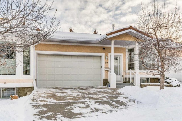Photo for MLS®# A2273041 - home for sale at 19 Signature Villas Southwest, Signal Hill, Calgary Alberta