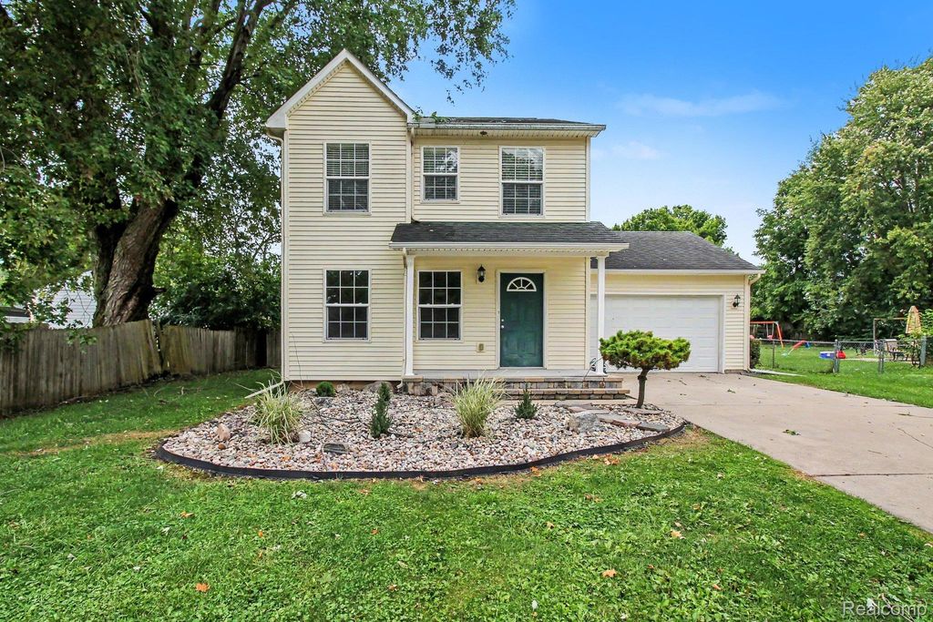 212 S Clark Street, Webberville village