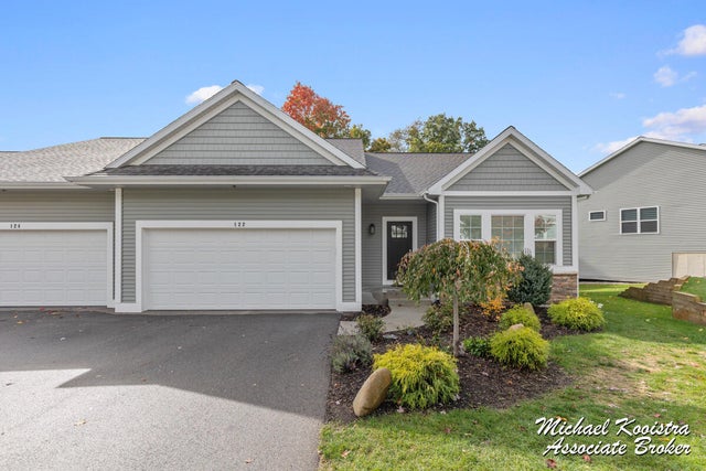 122 Blue Violet Lane Ne Unit: 99, Plainfield charter township